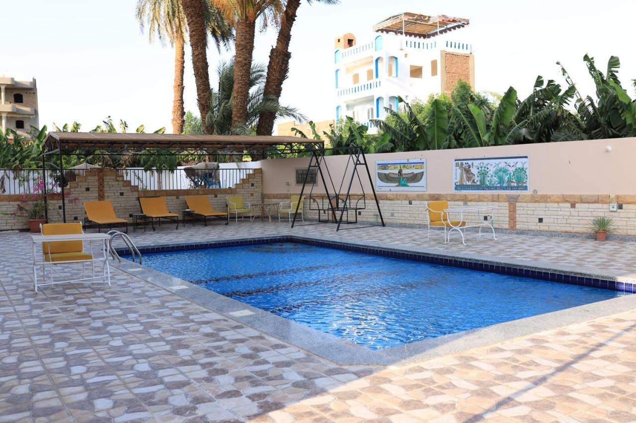 Dream Island Hotel Louxor Extérieur photo